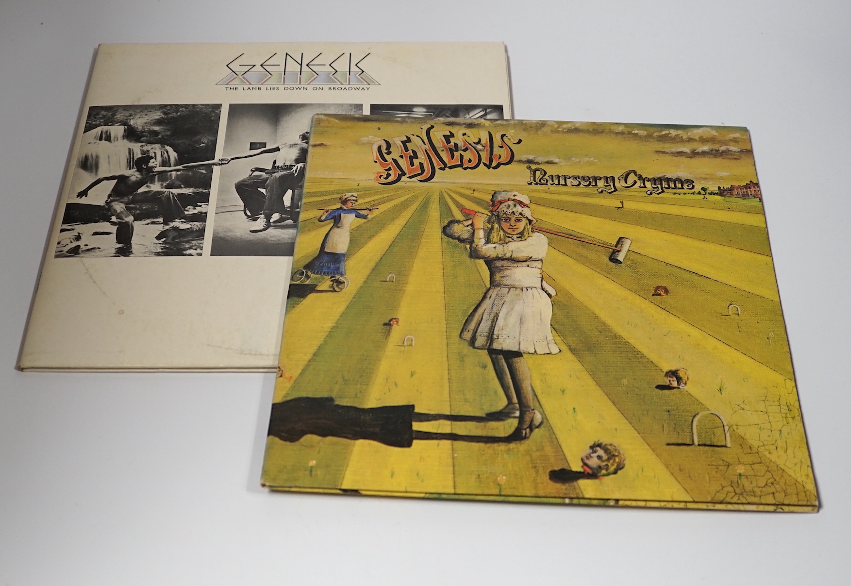 Two Genesis LP record albums; Nursery Cryme (CAS.1052) And the lamb lies down on Broadway (CG1A), both on Charisma